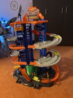 Hot Wheels Garage City MegaCity Parkgarage mit T-Rex Angriff