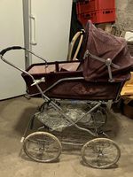 Antiker kinderwagen