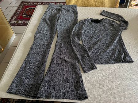 Completo 2 pezzi tg. S/M bianconero sintetico