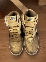 Nike Dunk High Sneaker Gold/Schwarz