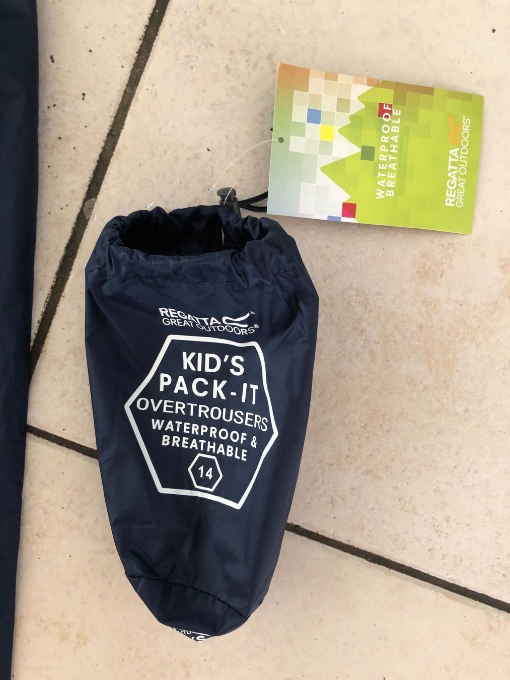 Pantaloni: Neue Regatta Packable Regenhose Gr.128 – Nuovo e nell'imballaggio originale da Obergerlafingen venduto da cabo4 1