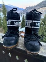 Schwarze, defekte Kinder Moon Boots Grösse: 27 / 30