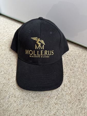 Schwarze Cap Mollerus Maison Suisse neuwertig