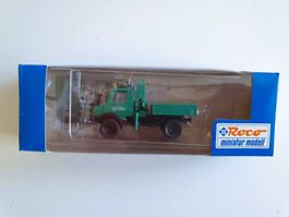 ROCO 1544, Unimog U1300 mit Pritsche, Hiab, Schwarzbau, neu
