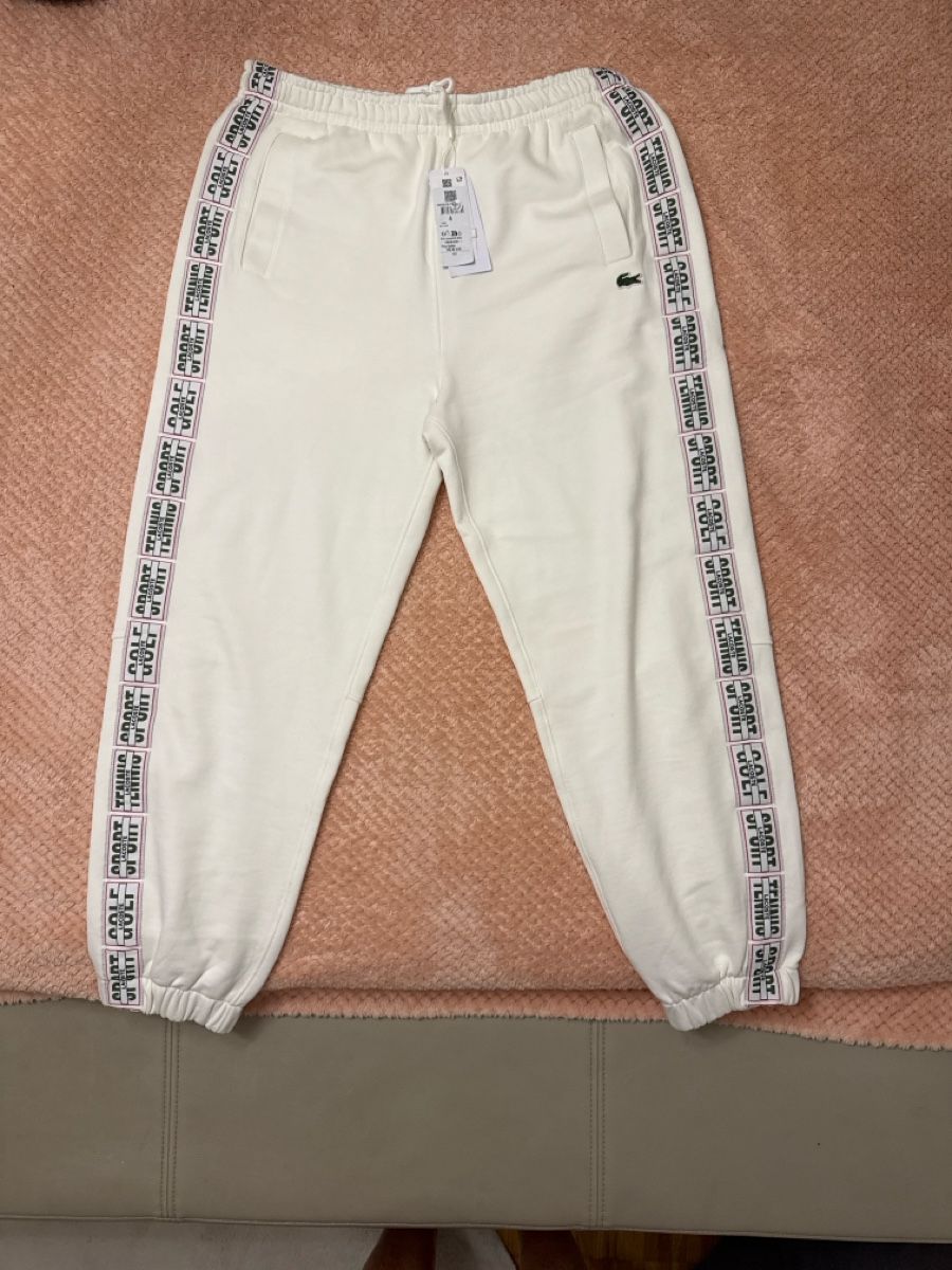Lacoste Pantaloni: Lacoste Pantalon de jogging blanc - Édition limitée! Taille – Nuovo e nell'imballaggio originale da Collombey venduto da Savito 1