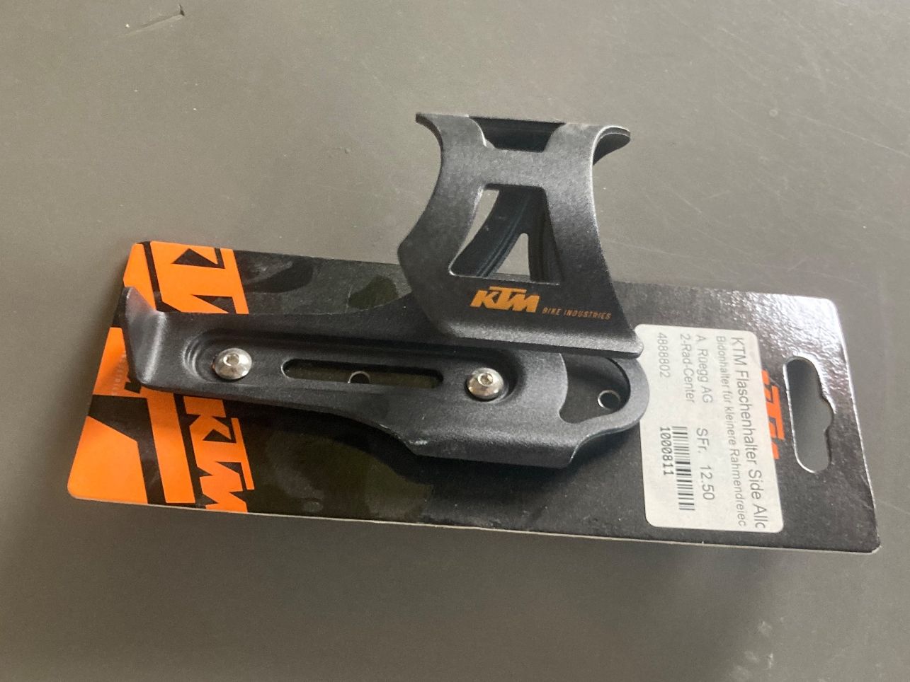 KTM Ersatzteile: 3 KTM Flaschenhalter(Nr.187) – Neu und originalverpackt aus Winterthur von Veloteileauktion 1