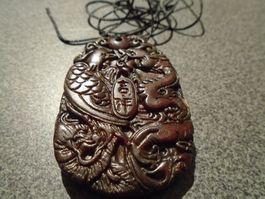 Anhänger Vogel/Schlange, oval/braun, schwarzes Band
