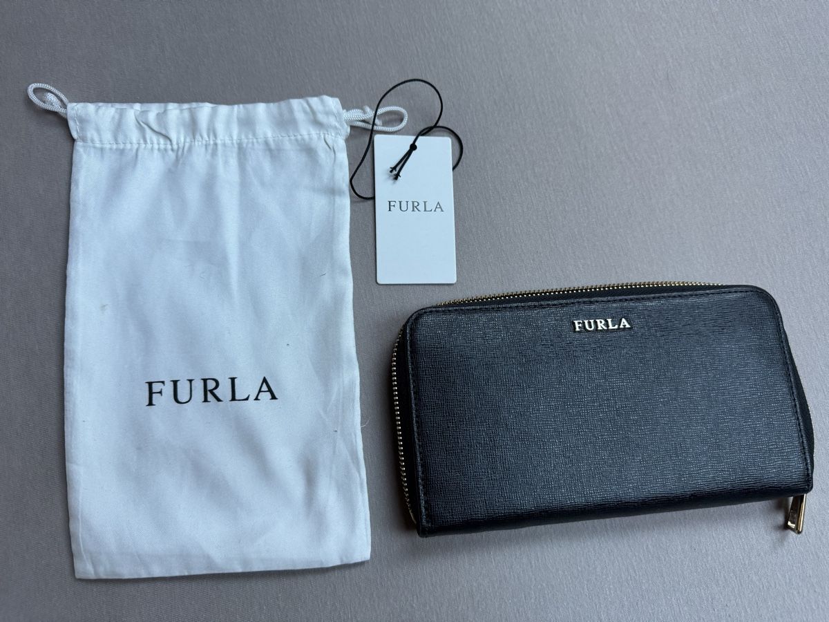 Furla Portafogli: Portefeuille Furla noir élégant – Nuovo e nell'imballaggio originale da Auvernier venduto da big_7srg