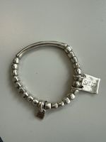 Silberfarbenes Armband Uno de 50 mit "Salud"-Anhänger