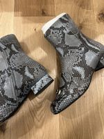 Bottines Gucci python T39 très bon état