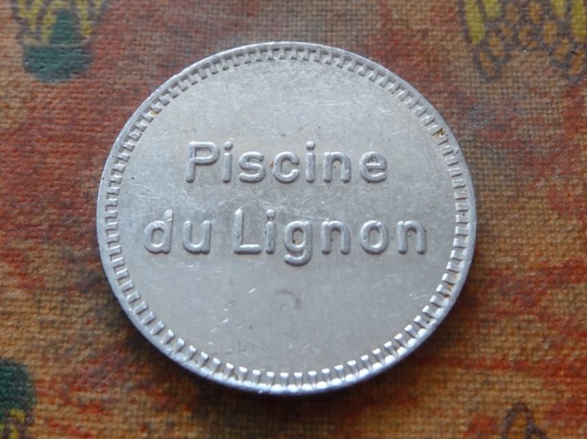 Tutti le monete: Jeton " Piscine du Lignon  /  Consigne " – Usato da Romanel-sur-Lausanne venduto da Swift13