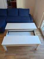 Table basse blanche avec plateau relevable