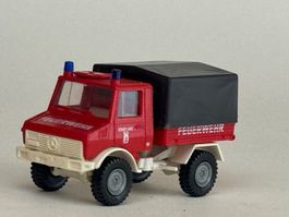 VE1- Roco  Mercedes Unimog Feuerwehr Pritsche