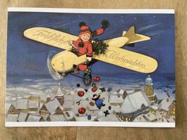 AK Kunstkarte Fröhliche Weihnachten Flugzeug Winterdorf