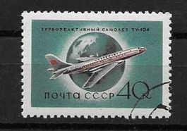 Sowjetunion 1958: Flugzeug Tupolew Tu-104 vor Erdkugel