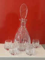 Magnifique carafe en cristal avec 4verres assortis