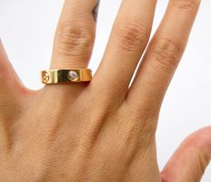 CARTIER "LOVE" RING IN 750 GELBGOLD MIT DIAMANTEN