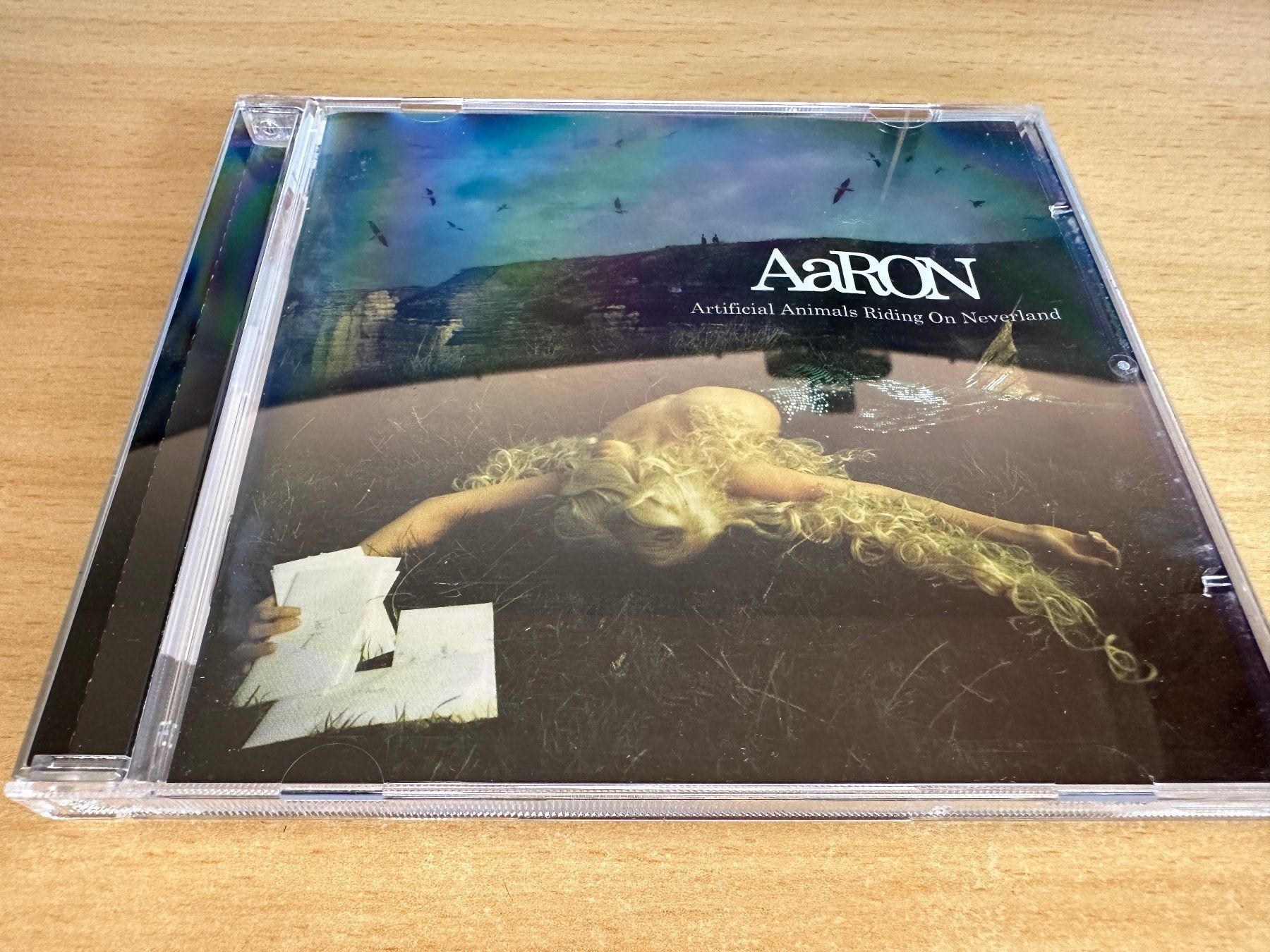 CD: AaRON - Artificial Animals Riding On Neverland – Usato da Rikon im Tösstal venduto da Alpenmutz