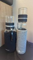 2 Trinkflaschen aus Glas 1l mit Siebeinsatz und Tasche