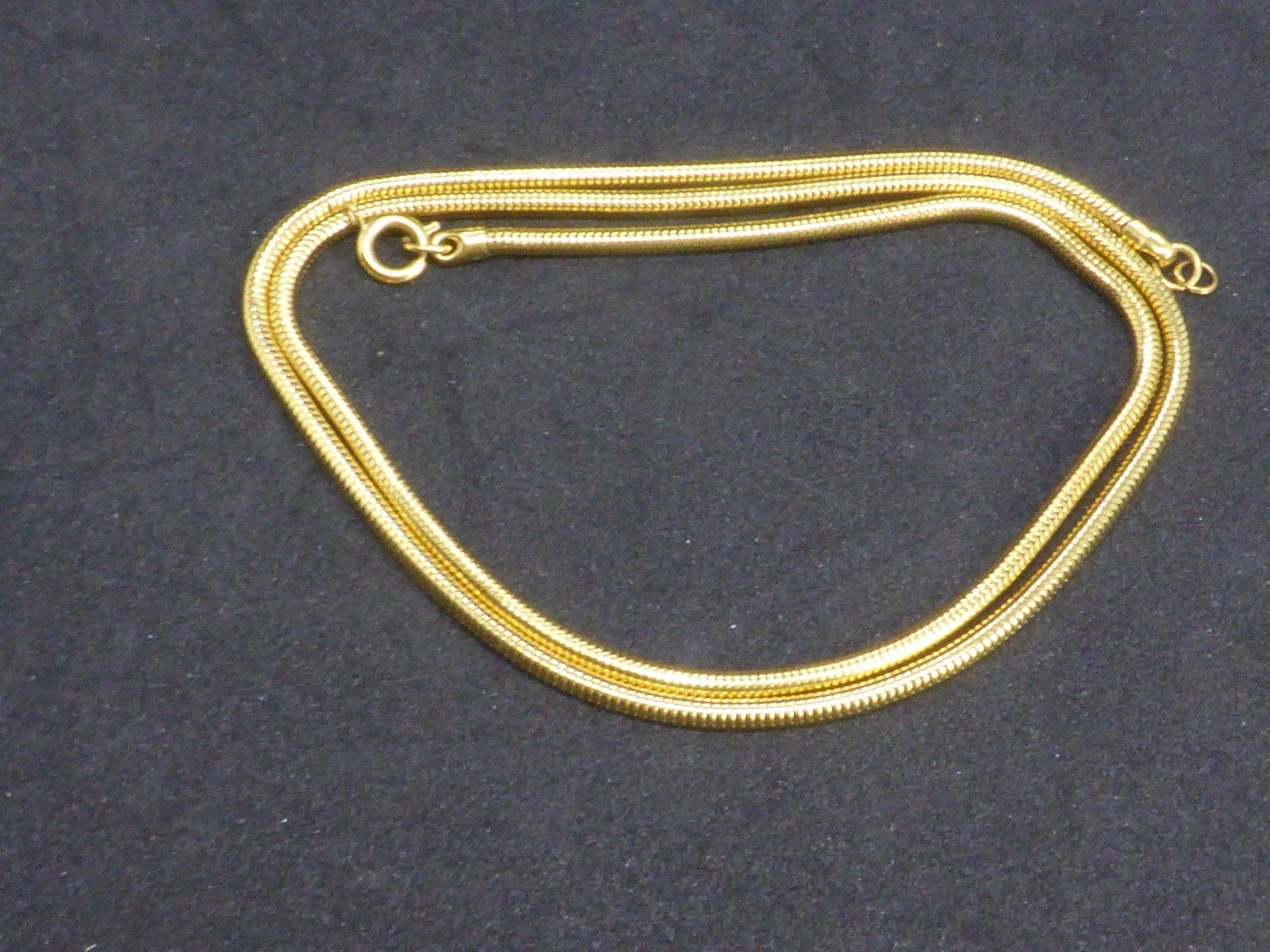 Ketten: Sautoir en plaqué or maille style serpent – Gebraucht aus Porrentruy von Tic-Time