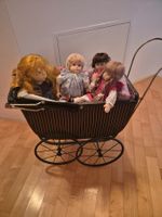 Puppen mit Puppenwagen