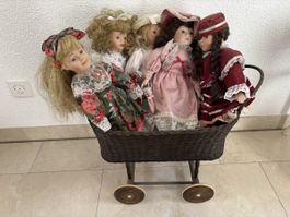 Porzelland Puppen im Kinderwagen 5 Stk guter Zustand