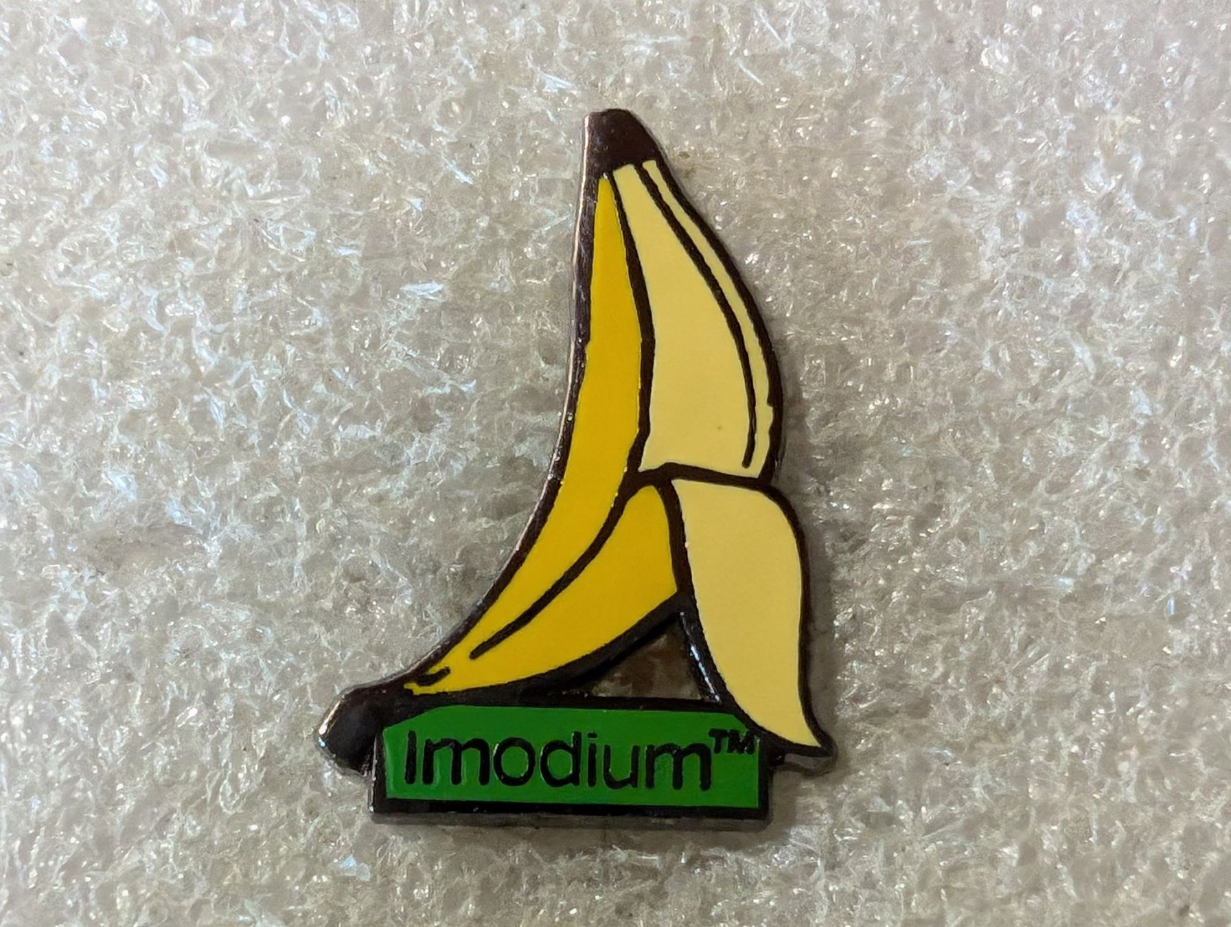 Plaketten & Abzeichen: Ansteckpin 158: Imodium – Gebraucht aus Oppligen von Pin-Fall-Shop