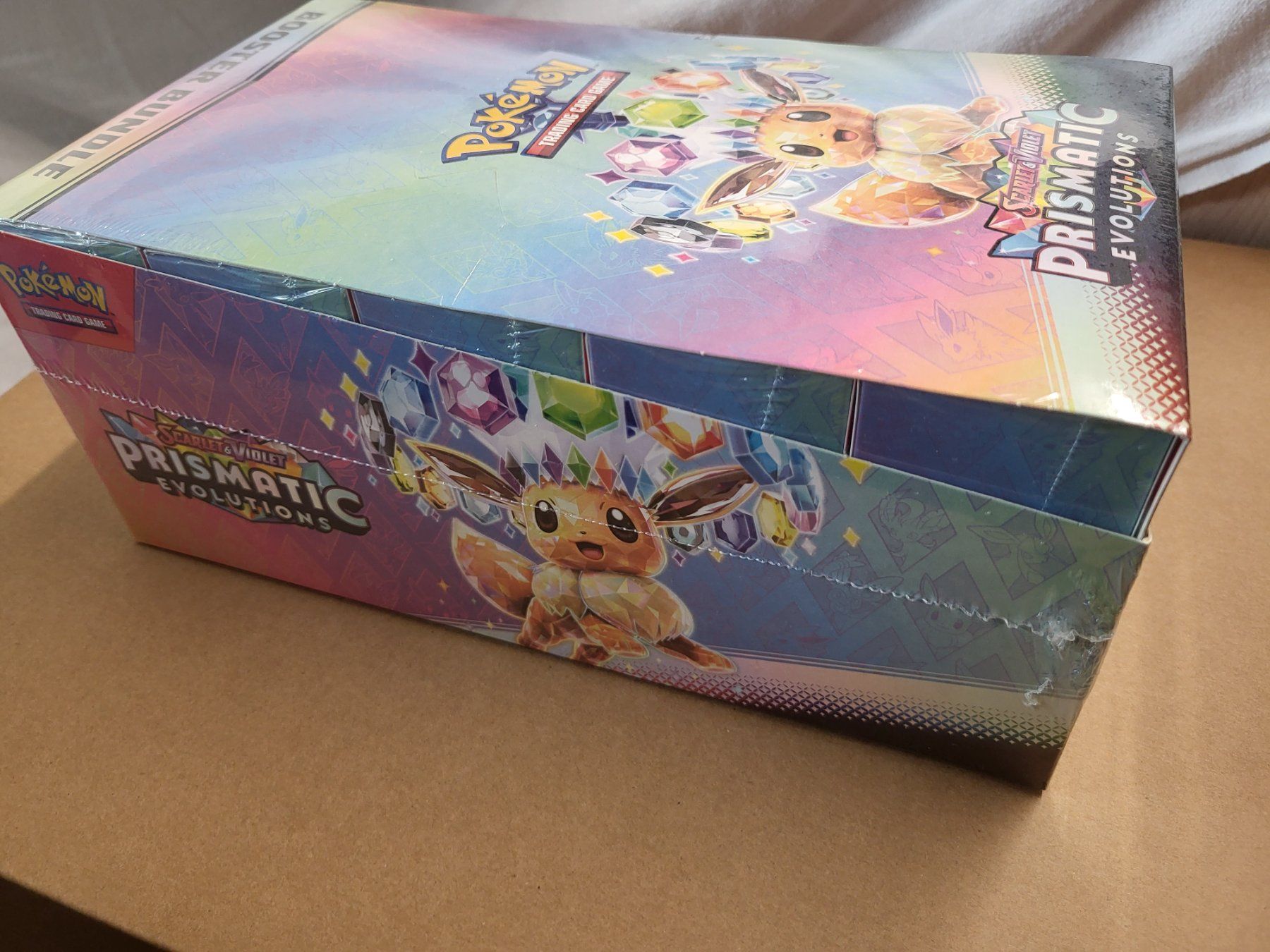 Pokémon Sammelbilder & Trading cards: Pokémon - Prismatic Evolutions Booster Bundle Display EN OVP – Neu und originalverpackt aus Däniken SO von pushback 2