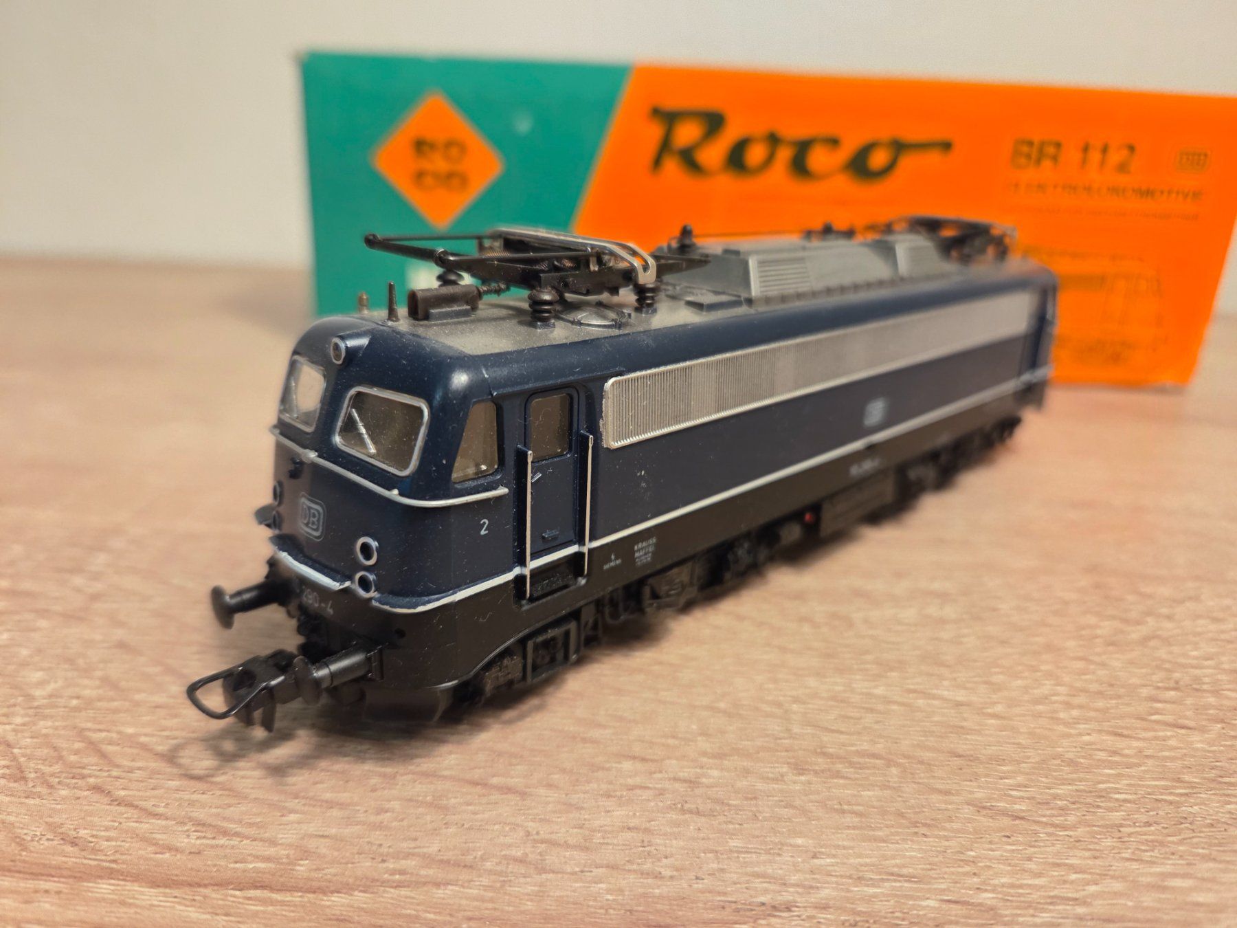 Roco Modellini di ferrovie: Roco 14138S E-Lok BR 112 DB H0 – Difettoso da St-Aubin-Sauges venduto da Lo_Go 2