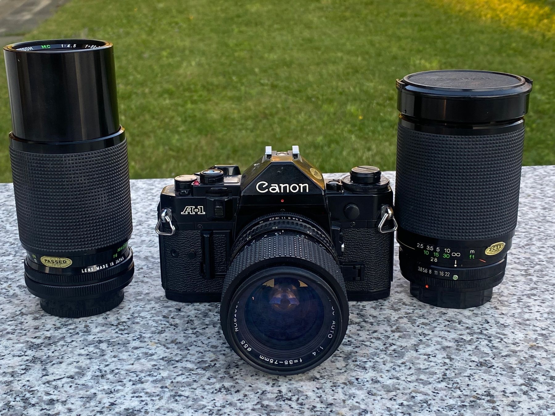 Canon Fotocamera: Canon A-1 avec 3x FD Objectives – Usato da Gisikon venduto da sombenin