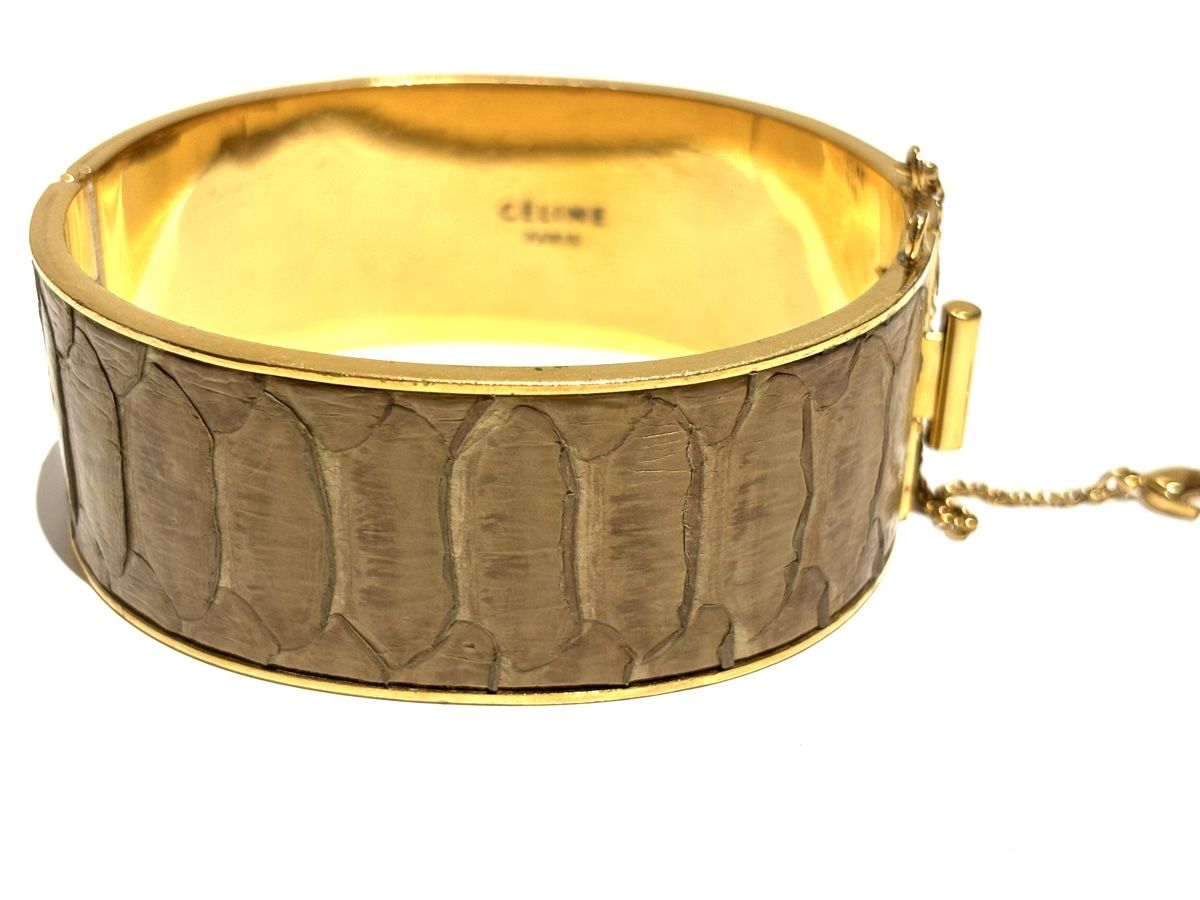 Celine Bracelets: CELINE Gold Plexi Python Bangle – D'occasion à Winterthur par Atelier.W 3