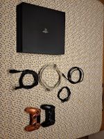 PlayStation 4 PRO Konsole mit 2 Controllern und 20 Spielen