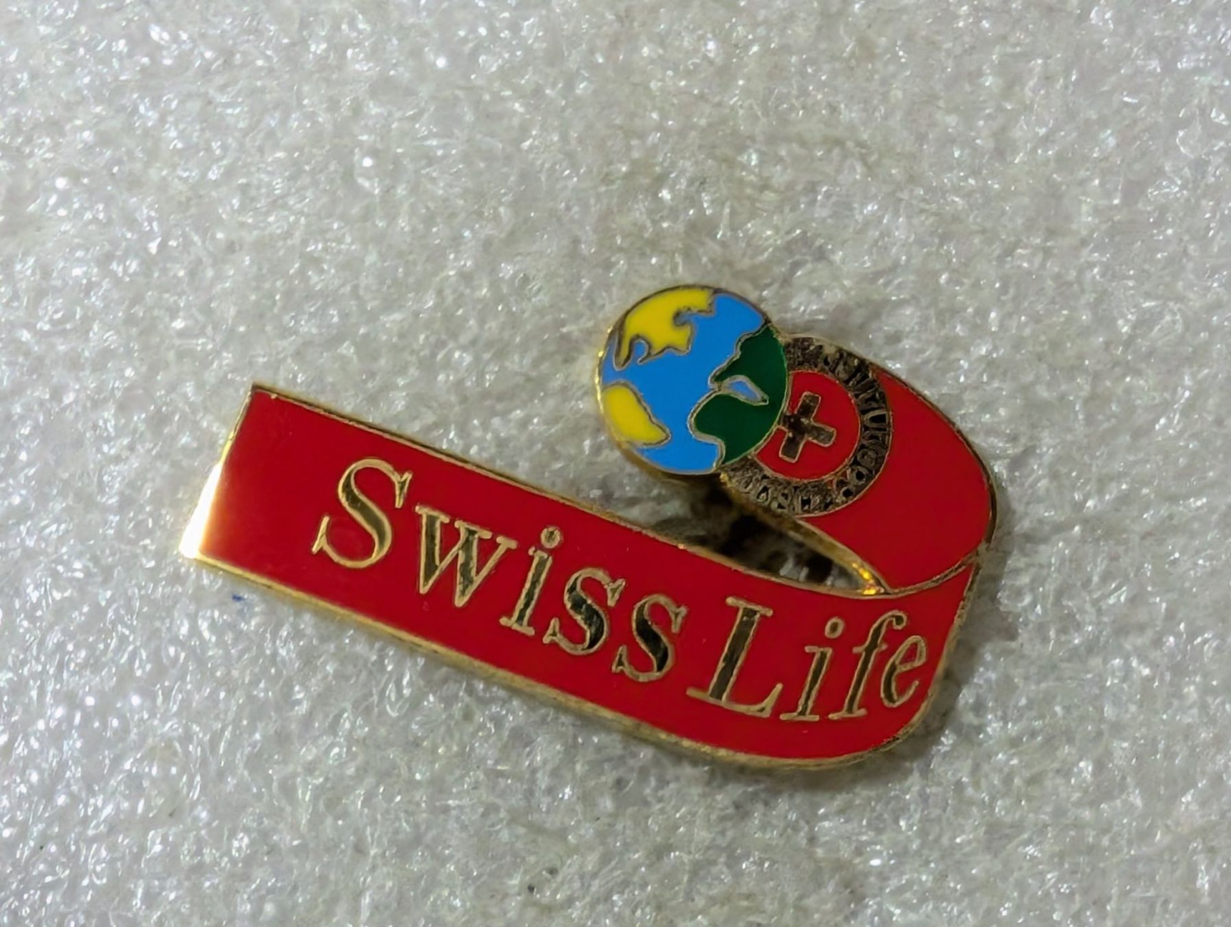 Plaketten & Abzeichen: Ansteckpin 116: Swiss Life – Gebraucht aus Oppligen von Pin-Fall-Shop