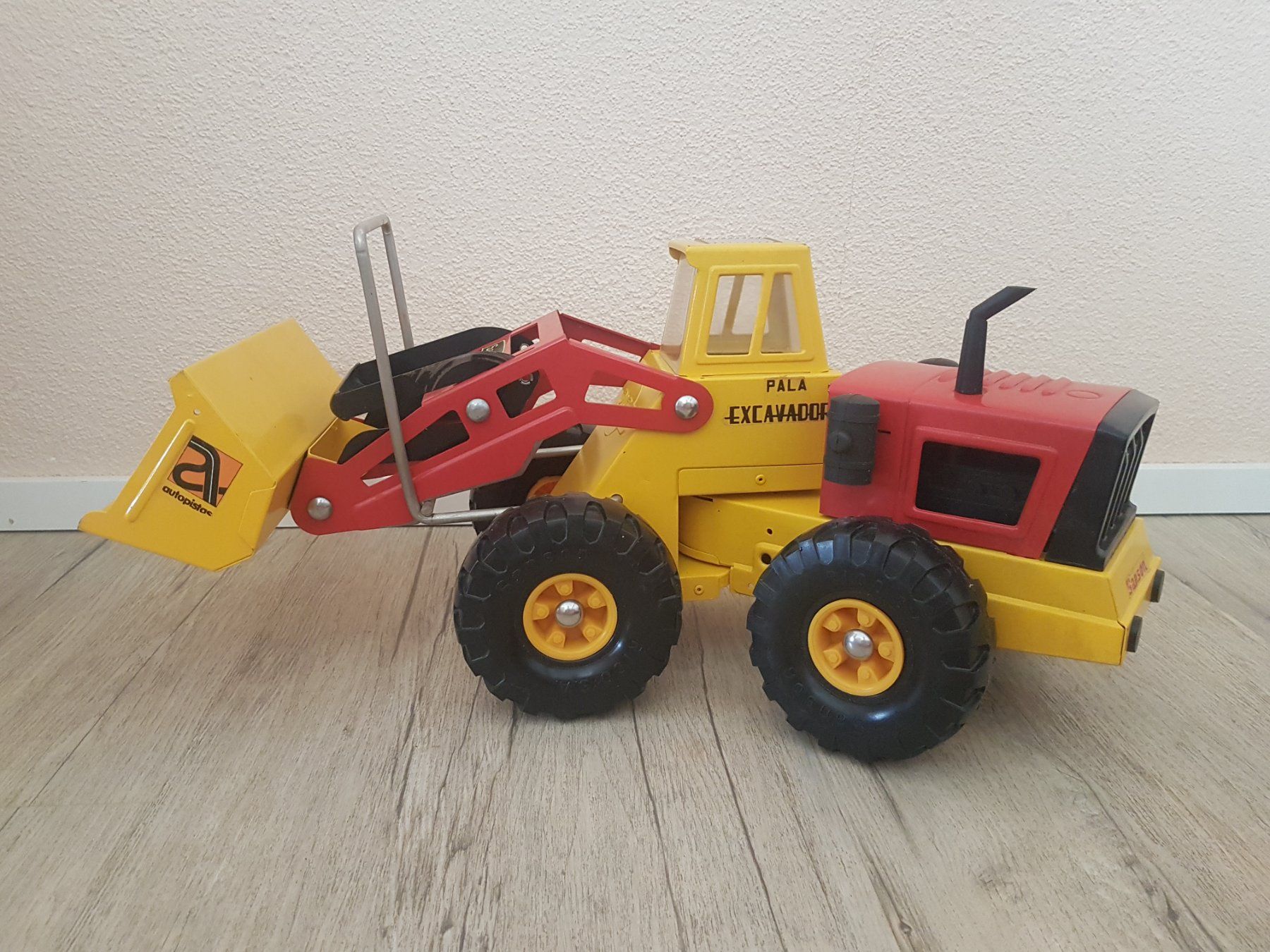 Spielzeuge: 70er Bagger Metall – Gebraucht aus Bauma von