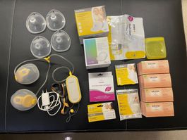 Medela Milchpumpe + grosses Still-Zubehör-Set