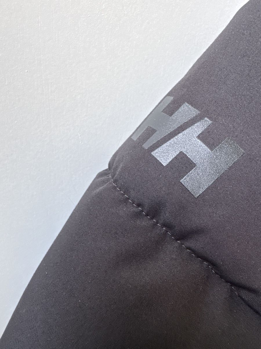 Helly Hansen Cappotti: Doudoune Helly Hansen noire, taille 128, comme neuve! – Usato da Puidoux venduto da serendipite 4