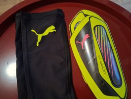 Puma Fussball Schienbeinschoner und Stutzen Schwarz Gelb