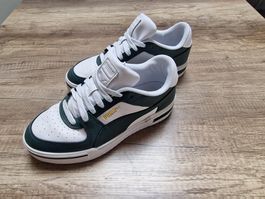 Puma unisex Sneaker dunkelgrün-weiss Gr. 42