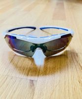 Lunettes de sport blanches et bleues bon état