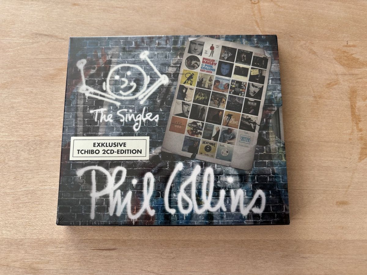CD: Phil Collins - The Singles (2CDs) – Nuovo e nell'imballaggio originale da Zürich venduto da Interpol