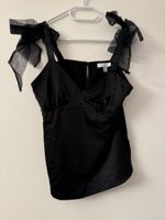Top noir satiné avec des noeuds - Élégant et léger