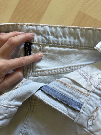Light Wash Denim Shorts with Rips - Perfect for Summer!
