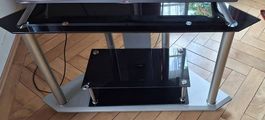 TV-Möbel aus Glas mit Rollen