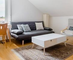 Bettsofa in elegantem Grauton