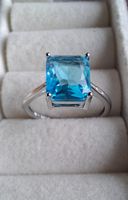 Bague élégante pierre bleue taille ajustable argent 925