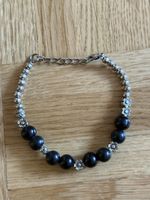 Armband schwarze Perlen mit Silberperlen und Blüten