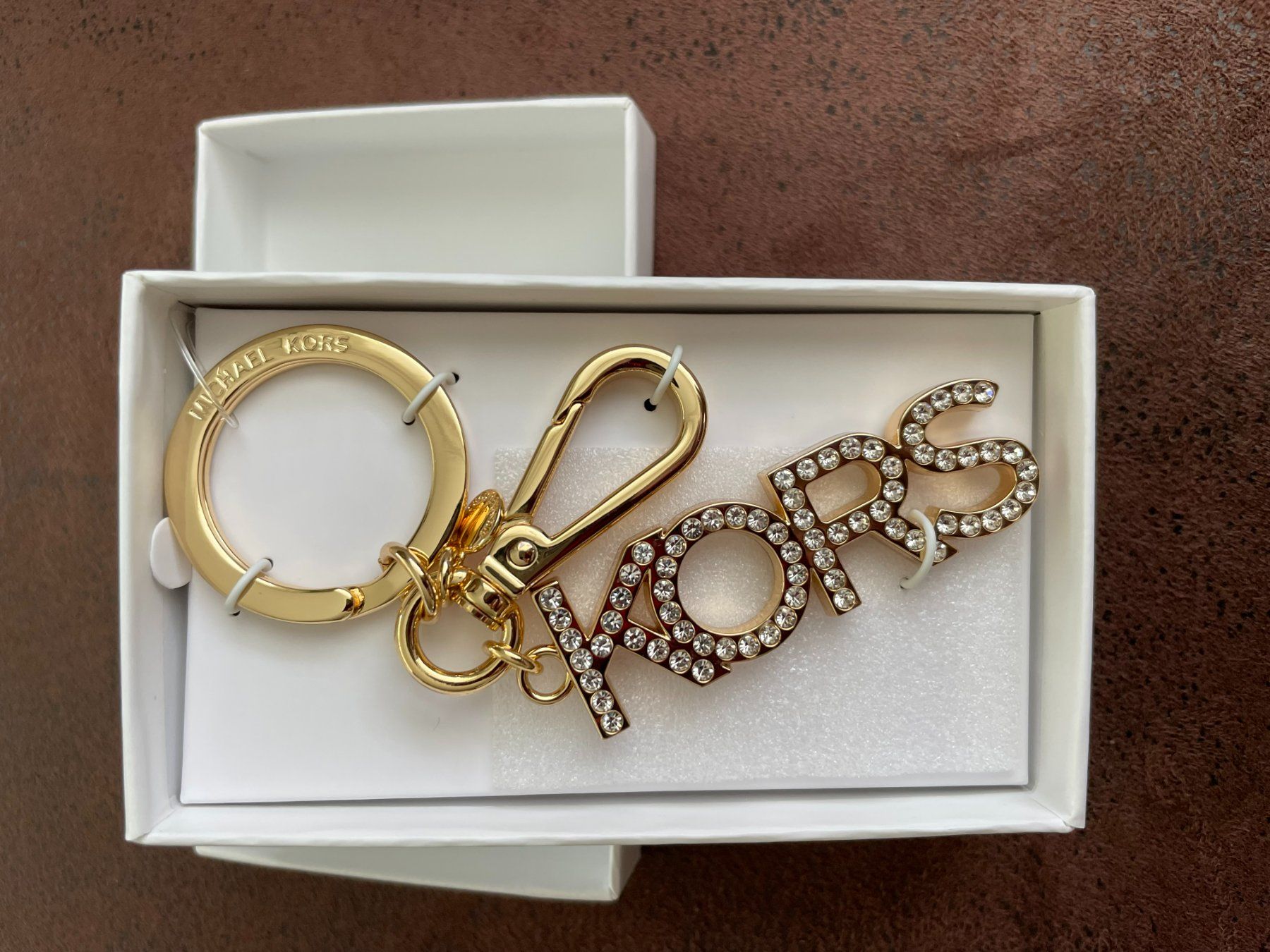 Michael Kors Portachiavi: MICHAEL KORS SCHLÜSSELANHÄNGER GOLD – Nuovo e nell'imballaggio originale da Kaiseraugst venduto da tombstonemarshal 1