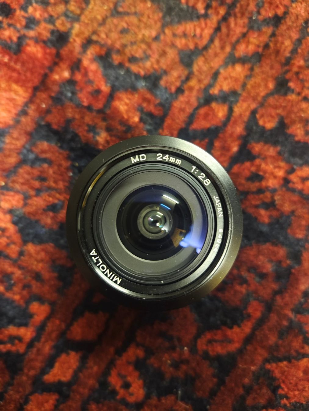 Minolta Obiettivi: Objectif Minolta MD 24mm / 1:2.8 – Usato da Neuchâtel venduto da Salseroni