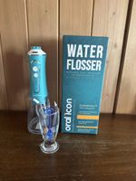 Oral Icon Water Flosser neuwertig mit Zubehoer