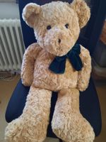 Grosser, hellbrauner Teddybär  mit grüner Velour-Schleife